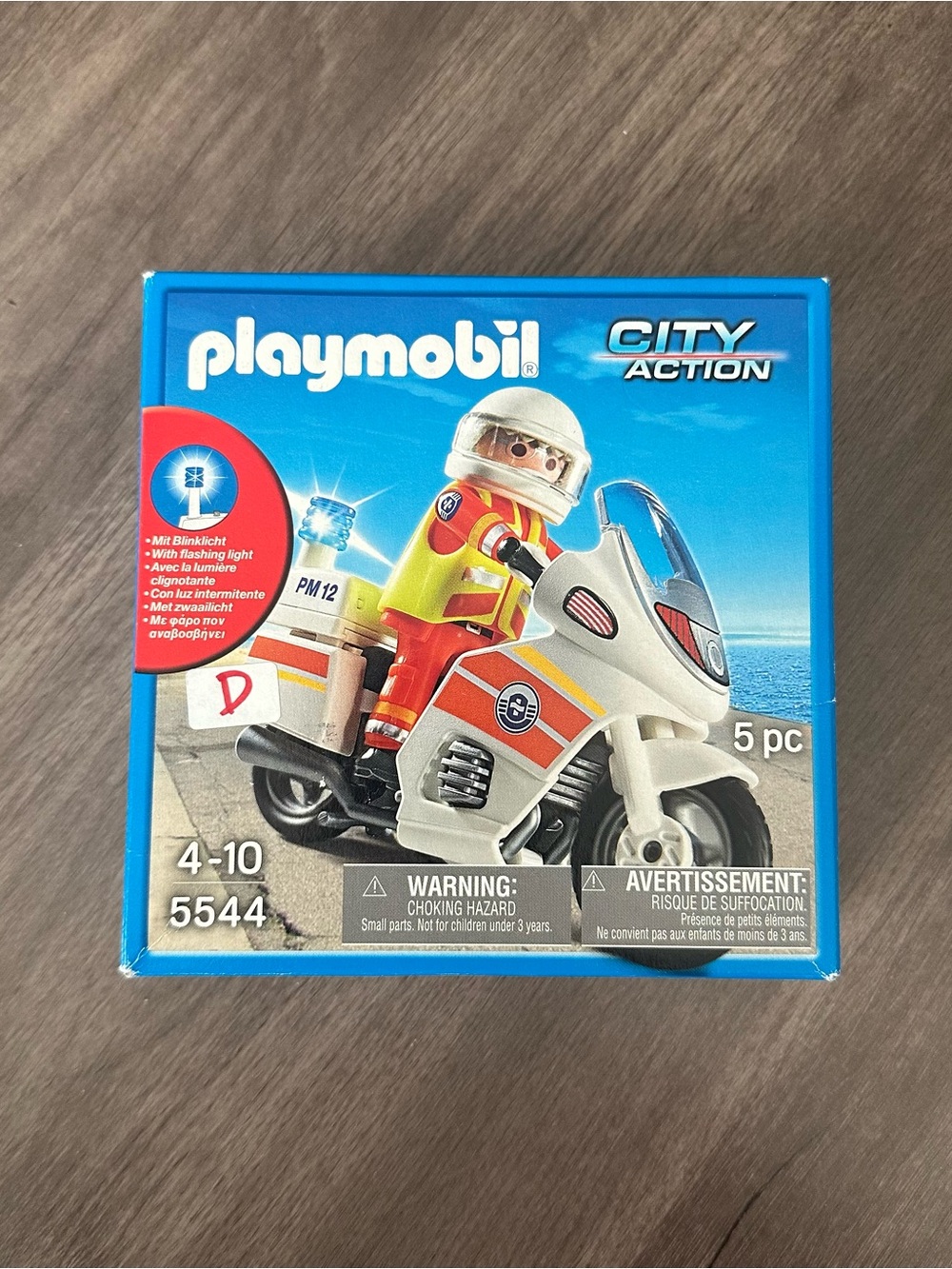 NIB, discontinued Playmobil Paramedic Motorcycle w/flashing emergency light 5544